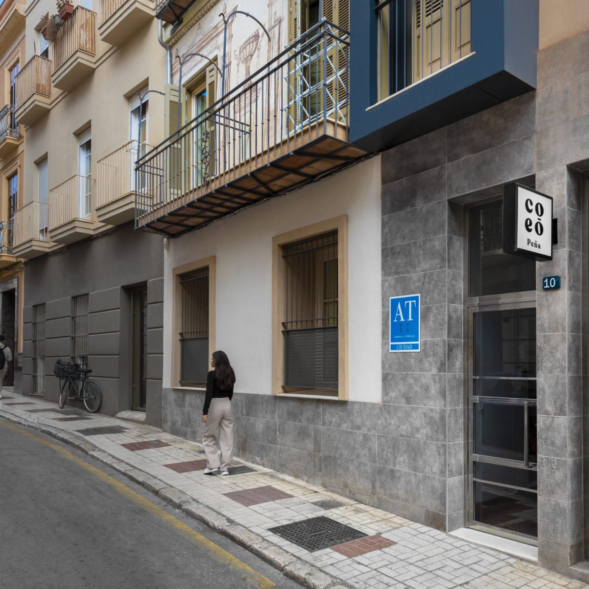Main entrance to Peña apartments in Malaga
